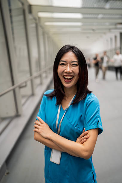 istock Smiling Asian Healthcare Worker 2210867468