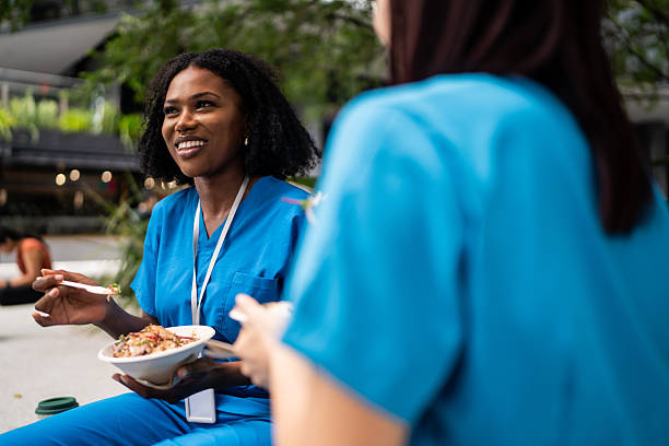 istock Outdoor Lunch Break for Healthcare Workers 2210867869