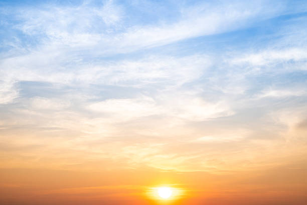 istock Beautiful , luxury soft gradient orange gold clouds and sunlight on the blue sky perfect for the background, take in evening,Twilight, Large size, high definition landscape photo 2210869291