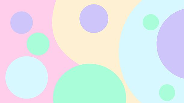 istock Colorful abstract circles in pastel pink, yellow, blue, green, and purple, overlapping playfully on a soft pink background 2210871755