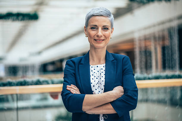 istock Confident Businesswoman in a Bright Office Setting 2210873014