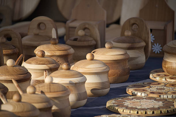 istock Handcrafted wooden containers and kitchenware add rustic charm to this artisan market stall display. 2210873197