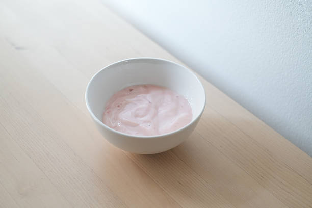 istock Homemade strawberry yogurt in white bowl. 2210875868