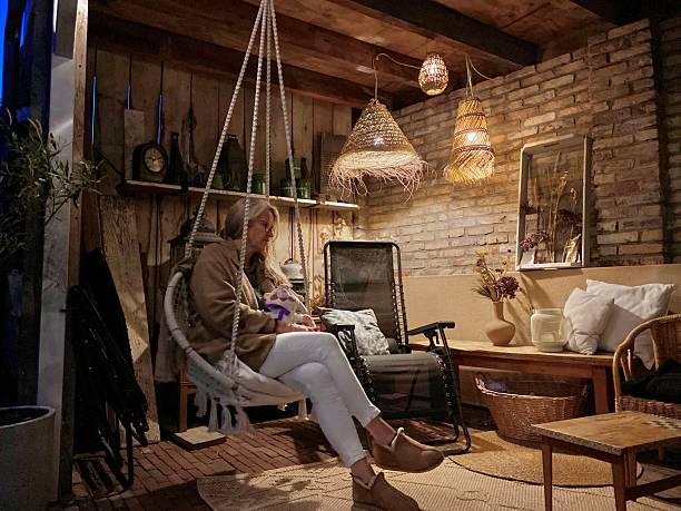 Relaxing  Woman sitting between her outdoor Hobbies