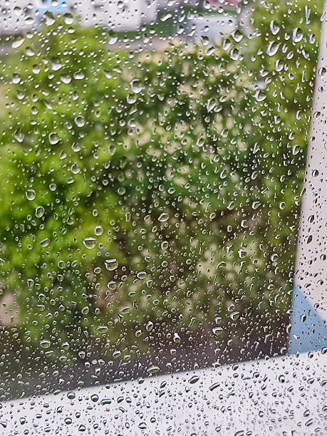 istock Raindrops on Glass – A Soft Focus Look Outside 2210879386