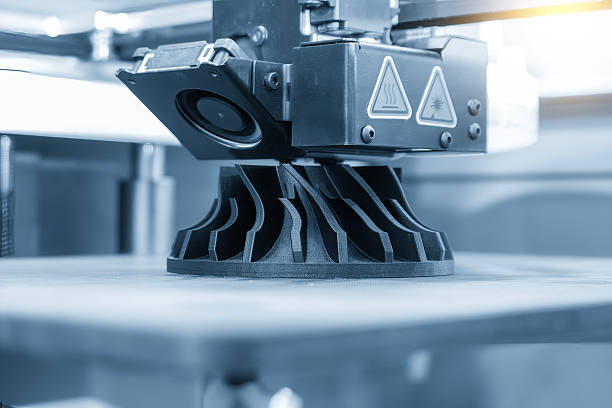 istock Close up scene the additive manufacturing by 3D printer machine in the light blue scene. 2210881222