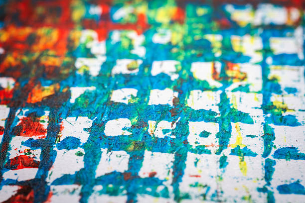 Extreme close up of colorful acrylic paint texture showing brush strokes. Selective focus.