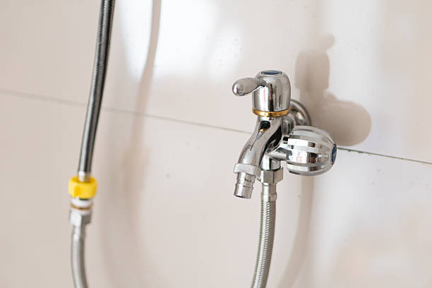istock Close-Up of a Modern Chrome Faucet 2210887233