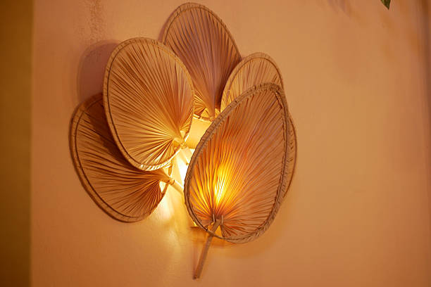 istock An elegant, leafshaped wall light fixture that creates a cozy ambiance 2210888612