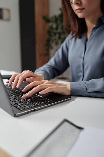 istock Woman Typing on Computer Keyboard in Office 2210892824