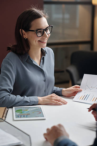 istock Smiling Woman Enjoying Work Meeting 2210892857
