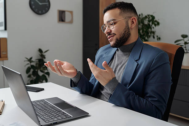 istock Middle Eastern Man Speaking in Online Meeting 2210892897