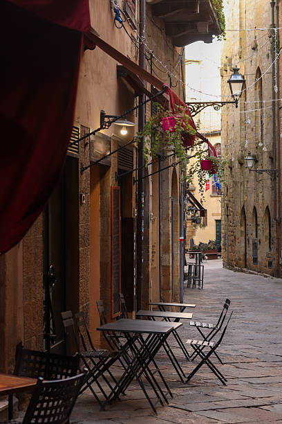 istock Narrow cobblestone street in Volterra 2210897961