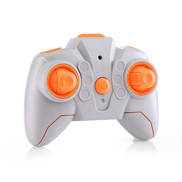 istock A gray remote control for a toy vehicle or quadcopter on a white background. A joystick from a radio-controlled vehicle. 2210901417