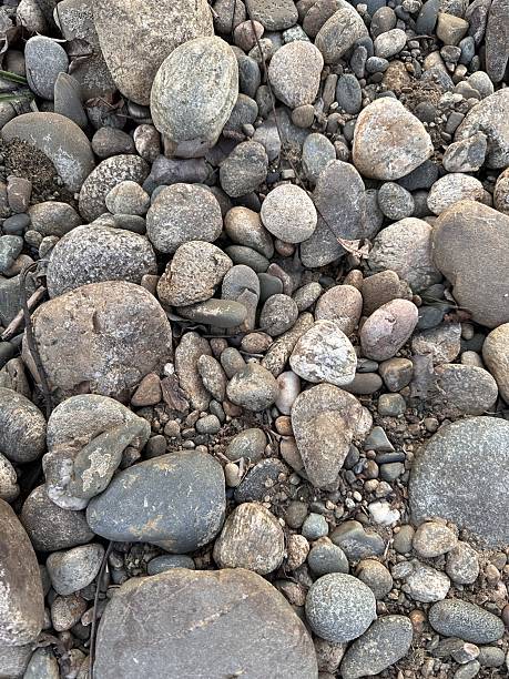 istock Natural River Stones and Pebbles Close-Up 2210904464