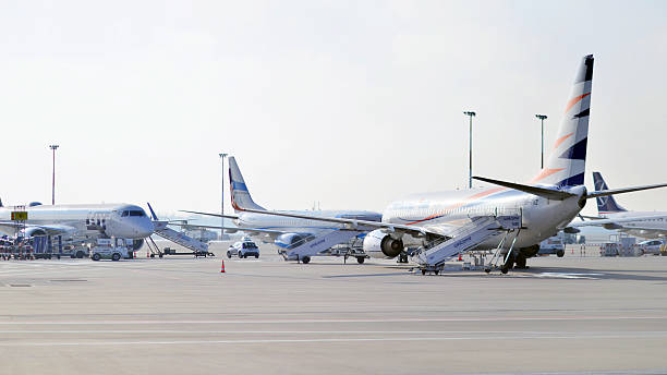 Warsaw ,Poland. 9 February 2025. Early morning view of planes parked at terminal Chopin airport