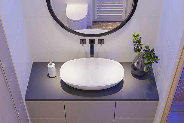 istock Minimalist Bathroom Vanity with Ambient Blue LED Lighting 2210914655