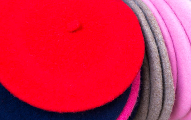 Paris, France: A group of colorful berets in a row outside a shop.