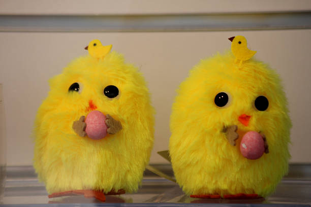 To small chicken Easter decoration with a small chick on their heads