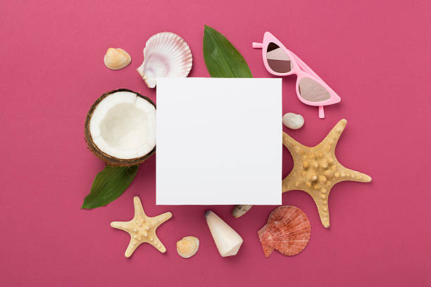 istock Summer banner with coconut and sea shells on color background. Vacation concept 2210917865