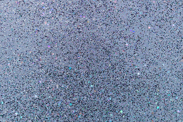 istock Sparkling lavender and black glitter texture background 2210920467