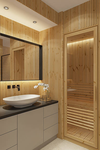 istock Scandinavian-Style Compact Bathroom with In-Home Sauna and Warm Lighting 2210920973