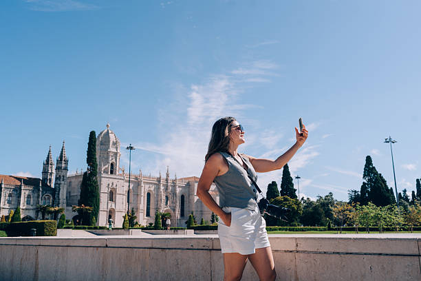 istock Woman taking a selfie at Lisbon 2210926620