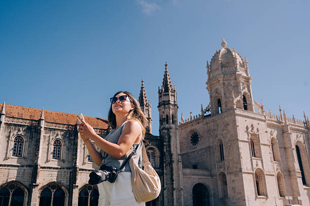 istock Woman using cell phone at Lisbon 2210926625