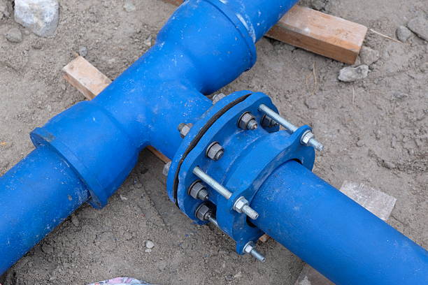 istock Cast metal pipe connection with flange 2210926671