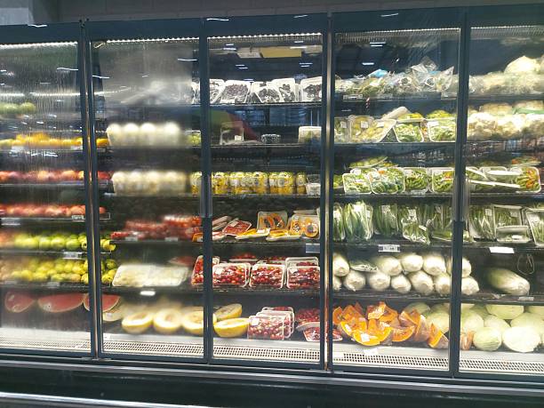 istock Supermarket display fridges in the fruit and vegetables section. 2210928096