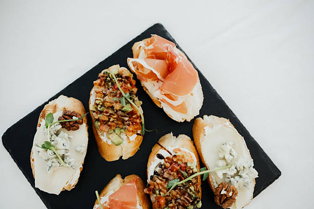 istock Delicious appetizers served on a slate platter at a casual gathering 2210932054