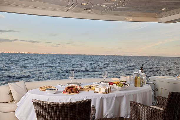istock Enjoy an Elegant Dining Experience on a Luxury Yacht While Overlooking the Beautiful Ocean 2210942332