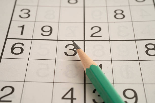 istock Sudoku puzzle, game to play for keep you brain younger for developing Alzheimer disease in senior patient. 2210943216