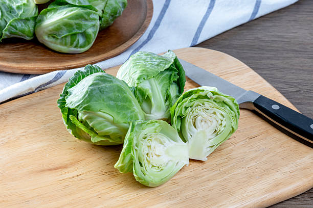 istock Baby Cabbage on the cutting board cooking 2210947077