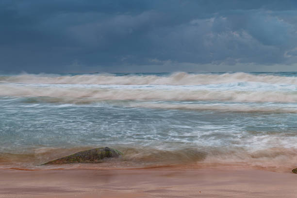 Moody sunrise seascape at Killcare Beach on the Central Coast of NSW, Australia.