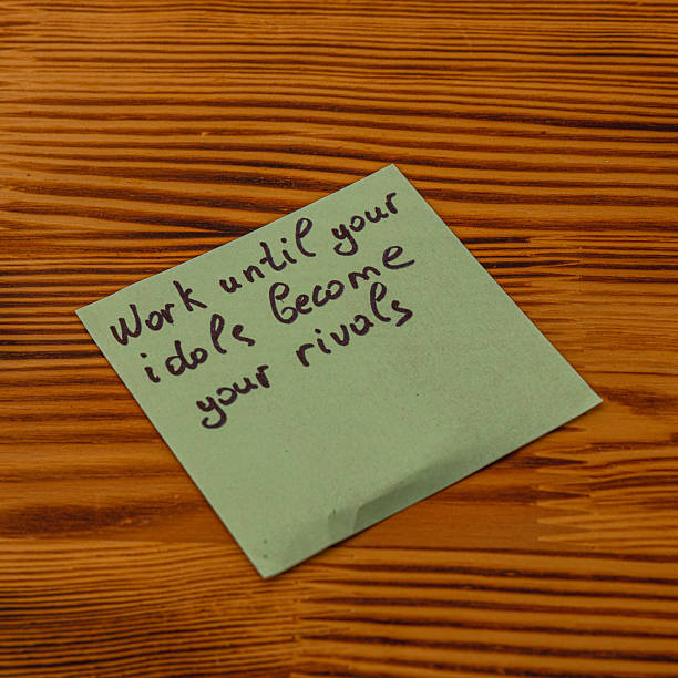 istock Inspirational reminder on a sticky note placed on a wooden table 2210948227