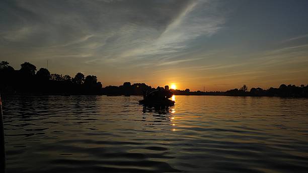 istock sunset in sipin lake 2210950690