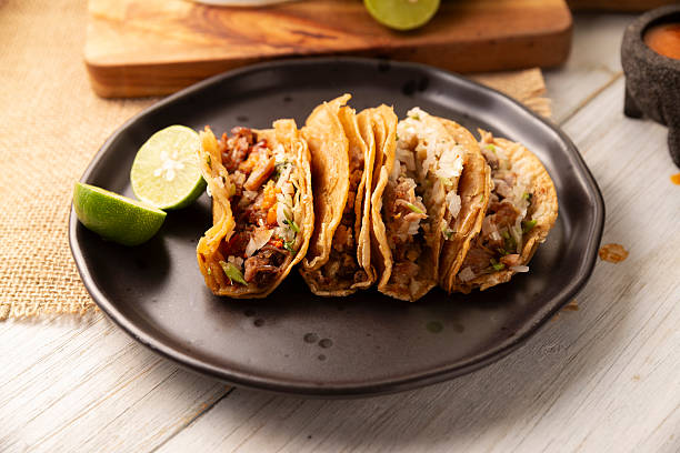 istock traditional mexican small tacos suadero 2210956898