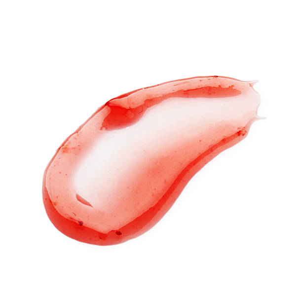 istock Sample of tasty strawberry sauce isolated on white 2210960430