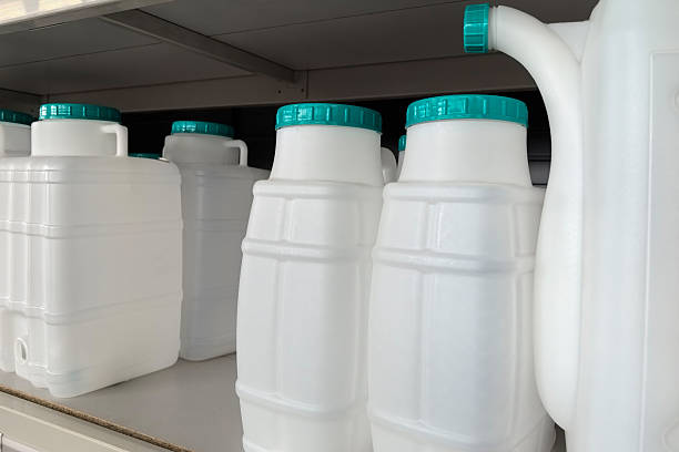 istock Containers filled with liquid arranged neatly on a modern shelf 2210962296