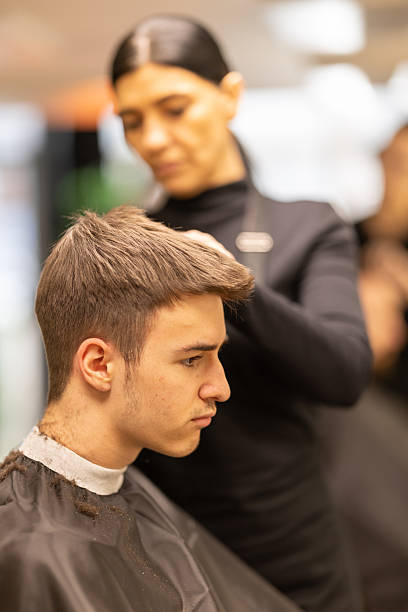 istock Young male client in a barber shop 2210963795