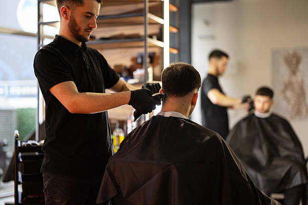 istock Young male client in a barber shop 2210964386