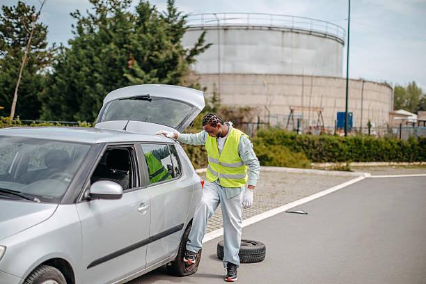 istock Man changing flat tyre on his car 2210964795