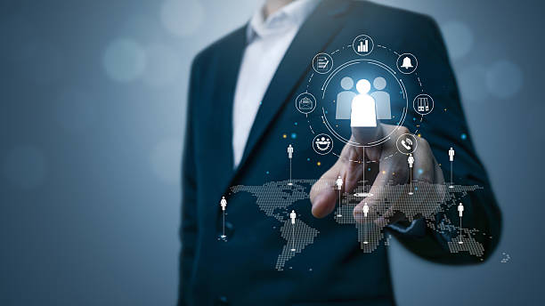 istock Customer relationship management,CRM Concept ,business network structure ,businessman touch person icon on virtual screen Represents the marketing strategy of organization business. 2210965578
