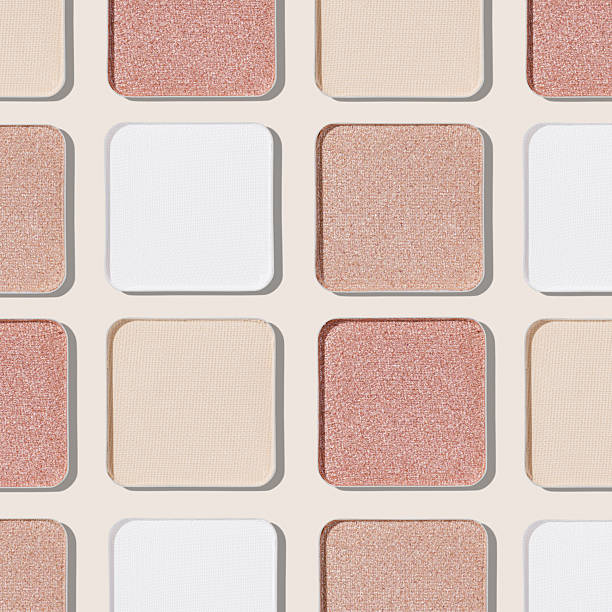 istock Cosmetics texture pattern, makeup palette pastel neutral color eye shadow, square eye powder swatches. Female cosmetic and beauty products, aesthetic minimal beauty photo, shimmer eyeshade, top view 2210967902