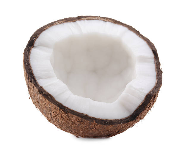 istock Half of cracked coconut isolated on white 2210968516