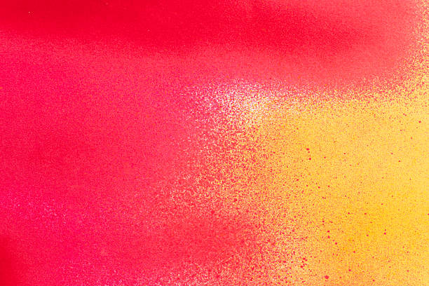 istock Red and yellow spray paint background 2210973483