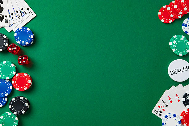 istock Casino game elements frame green background from corners. Poker chips, cards, dice, dealer button. Flat lay gambling concept with central copy space. 2210974371