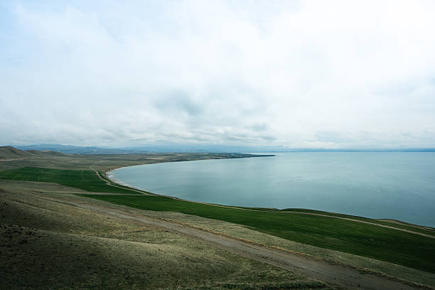 Breathtaking view of van lake, the largest soda lake in the world, located in eastern anatolia, turkey, under a cloudy sky