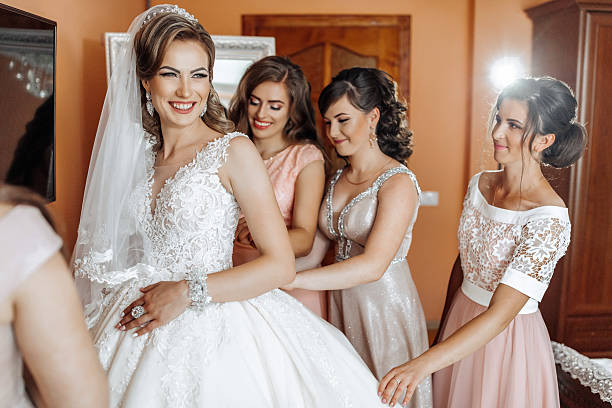 istock A bride and her bridesmaids are getting ready for the wedding 2210980342